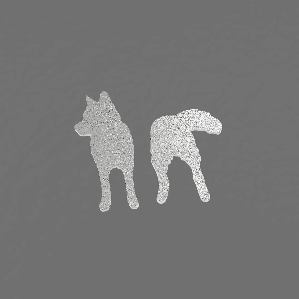 Husky-aiheiset nappikorvakorut. Mattapintaista hopeaa.