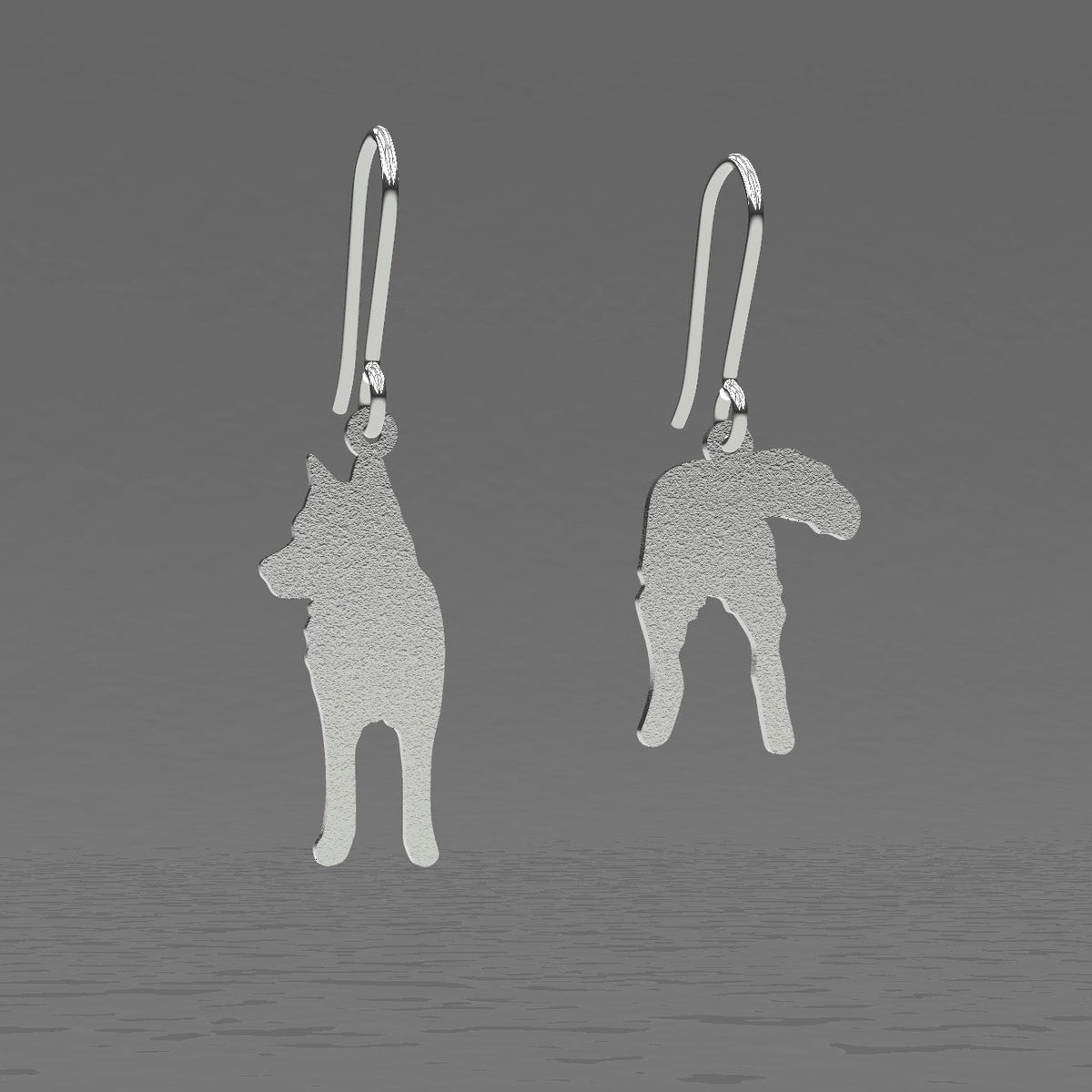 Husky-hopeakorvakorujen 3D-mallinnos. Koruissa on koukkumekanismi ja mattapinta.